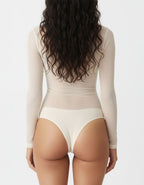 Ефирно Съвършенство: Тюлено Боди-Блуза с Прашка

Почувствайте нежността, носете увереност!

Представяме Ви нашето Тюлено Боди-Блуза с Прашка– идеалното допълнение към Вашия гардероб, което съчетава чувственост, комфорт и модерен стил. Това не е просто бельо, а елемент, който преобразява всяка визия и подчертава Вашата женственост.

Невероятна Мекота: Фината тюлена материя гали кожата, осигурявайки несравним комфорт през целия ден.

Универсален Стил: Носете го като боди-блуза под сако, жилетка или самостояте